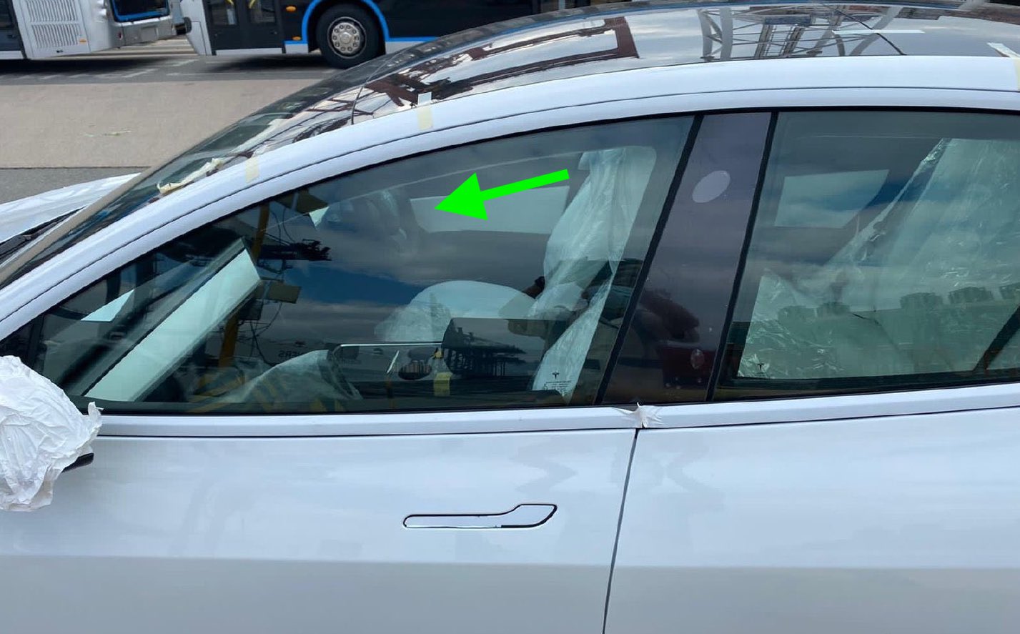 photo of Tesla China’s RHD Model 3 with new center console and black trim spotted in Hong Kong image