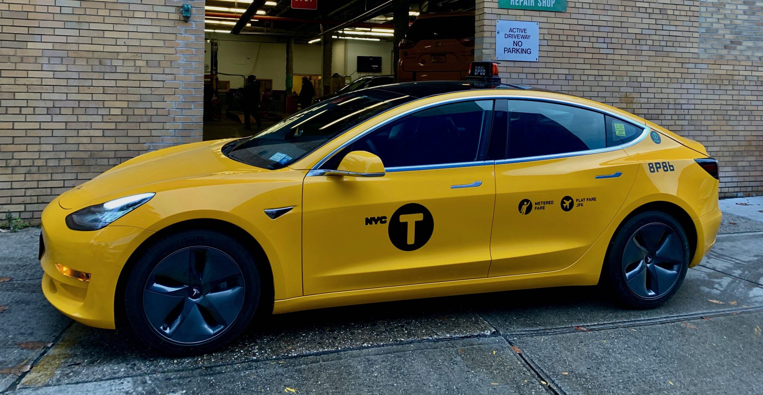 Download Tesla Model 3 wins hearts as famed NYC Taxi, picks up ...