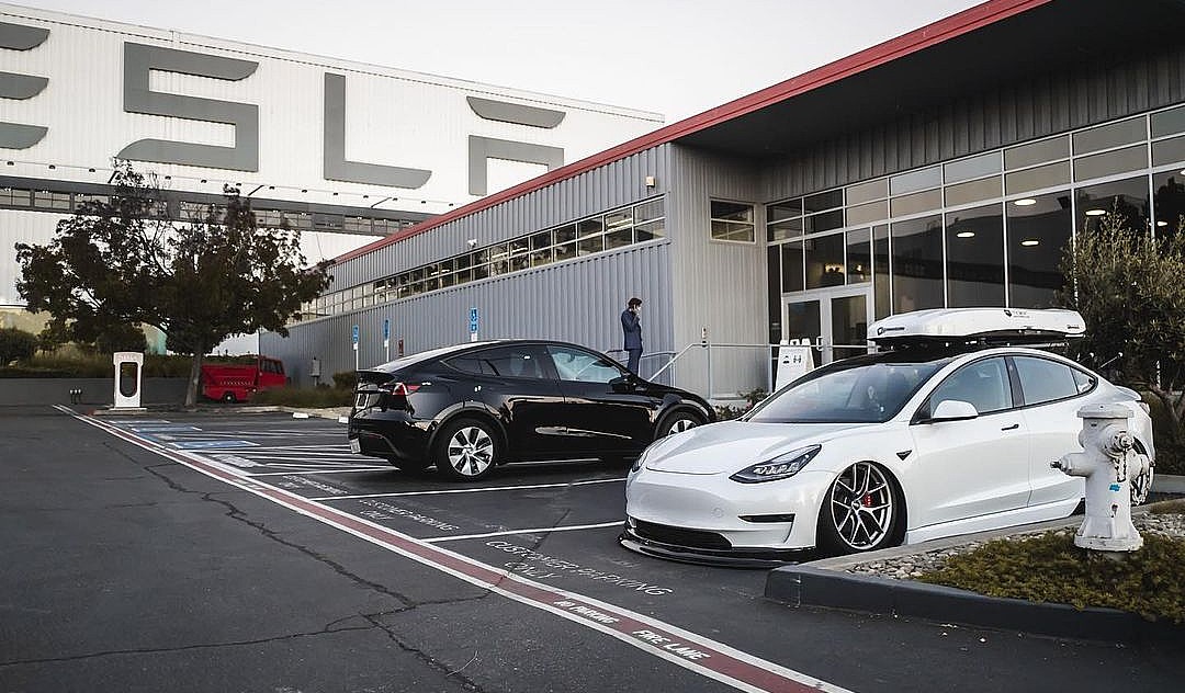 Tesla Model X and Tesla Model 3 sitting outside of Tesla's Fremont Factory in Northern California.