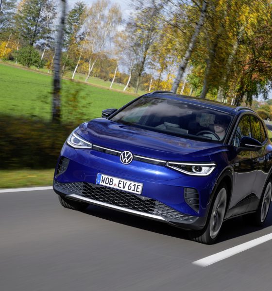 volkswagen id.4 on road in blue