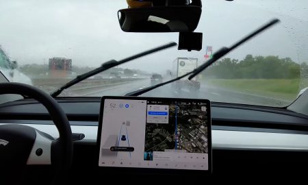 tesla in rain autopilot