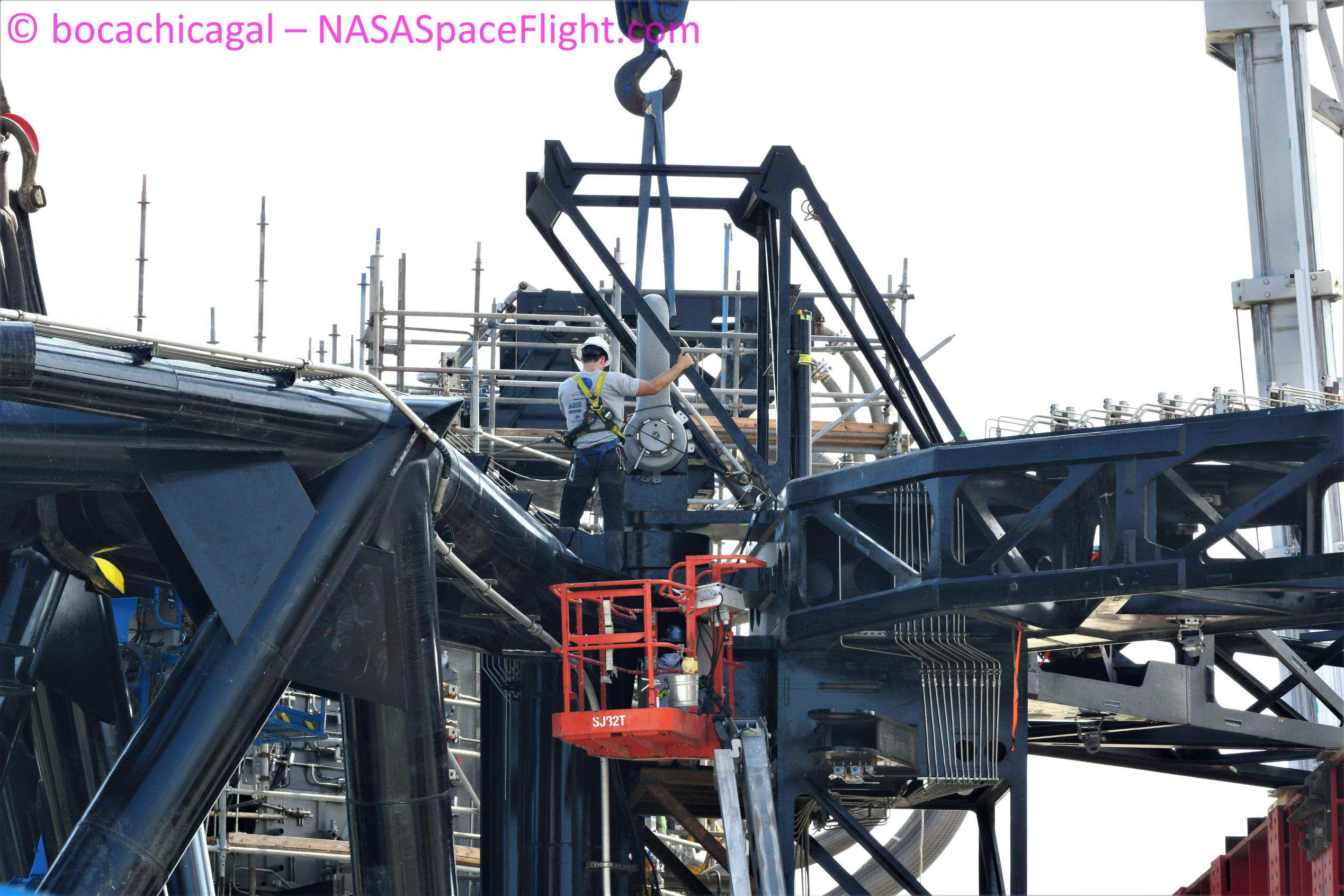 Starbase 101421 (NASASpaceflight – bocachicagal) catch arms pin 1 (c)