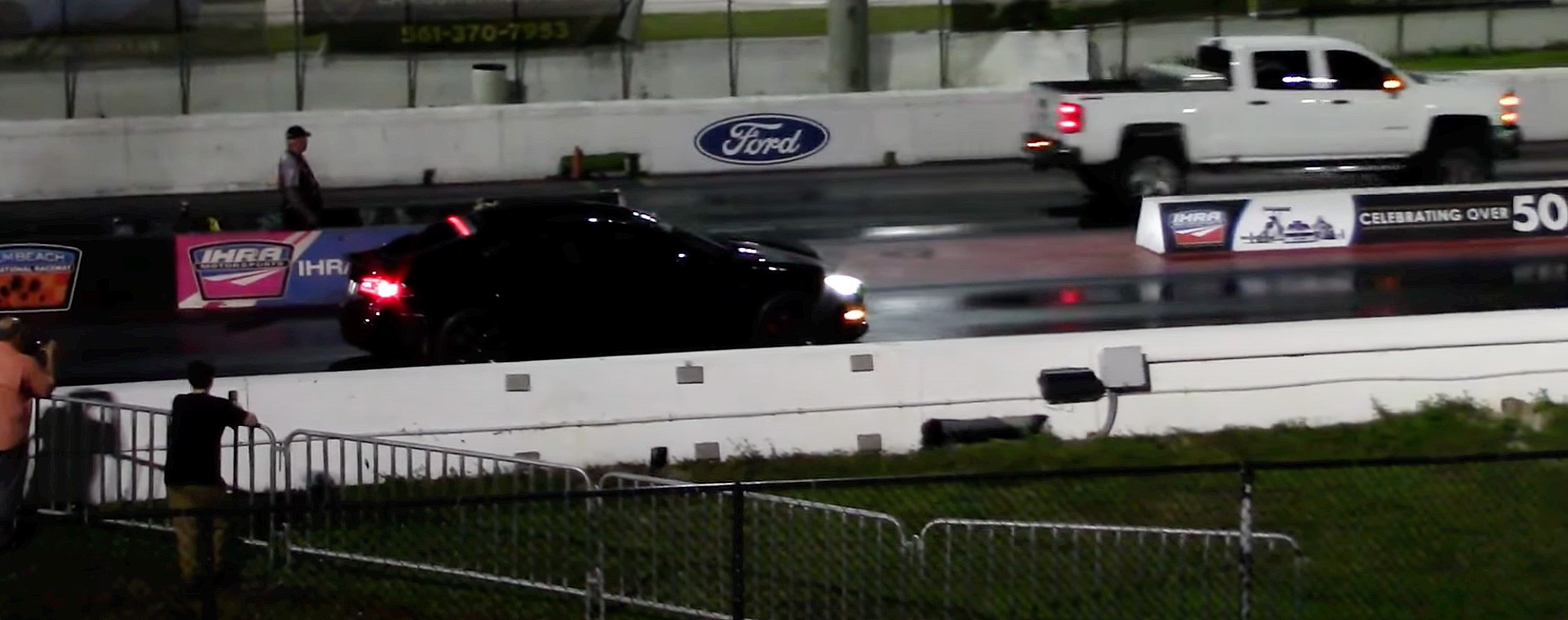 tesla model s plaid accidentally starts drag race in reverse wins anyway