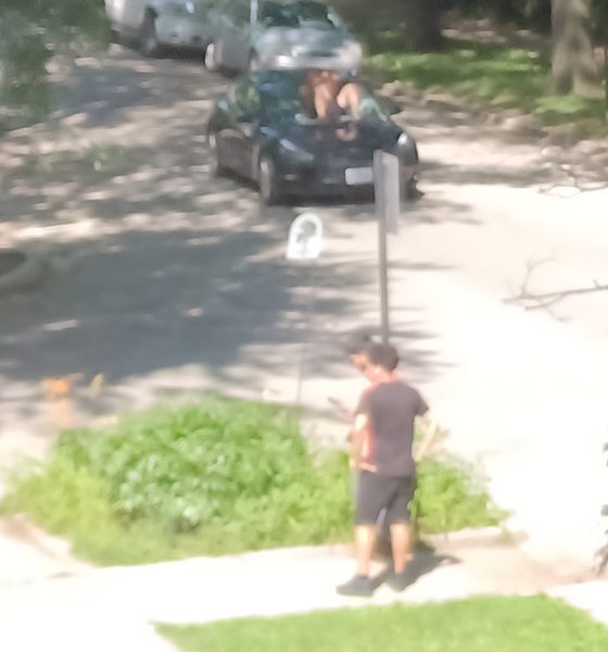 Agitated man destroys Tesla Model S Windshield & Sunroof