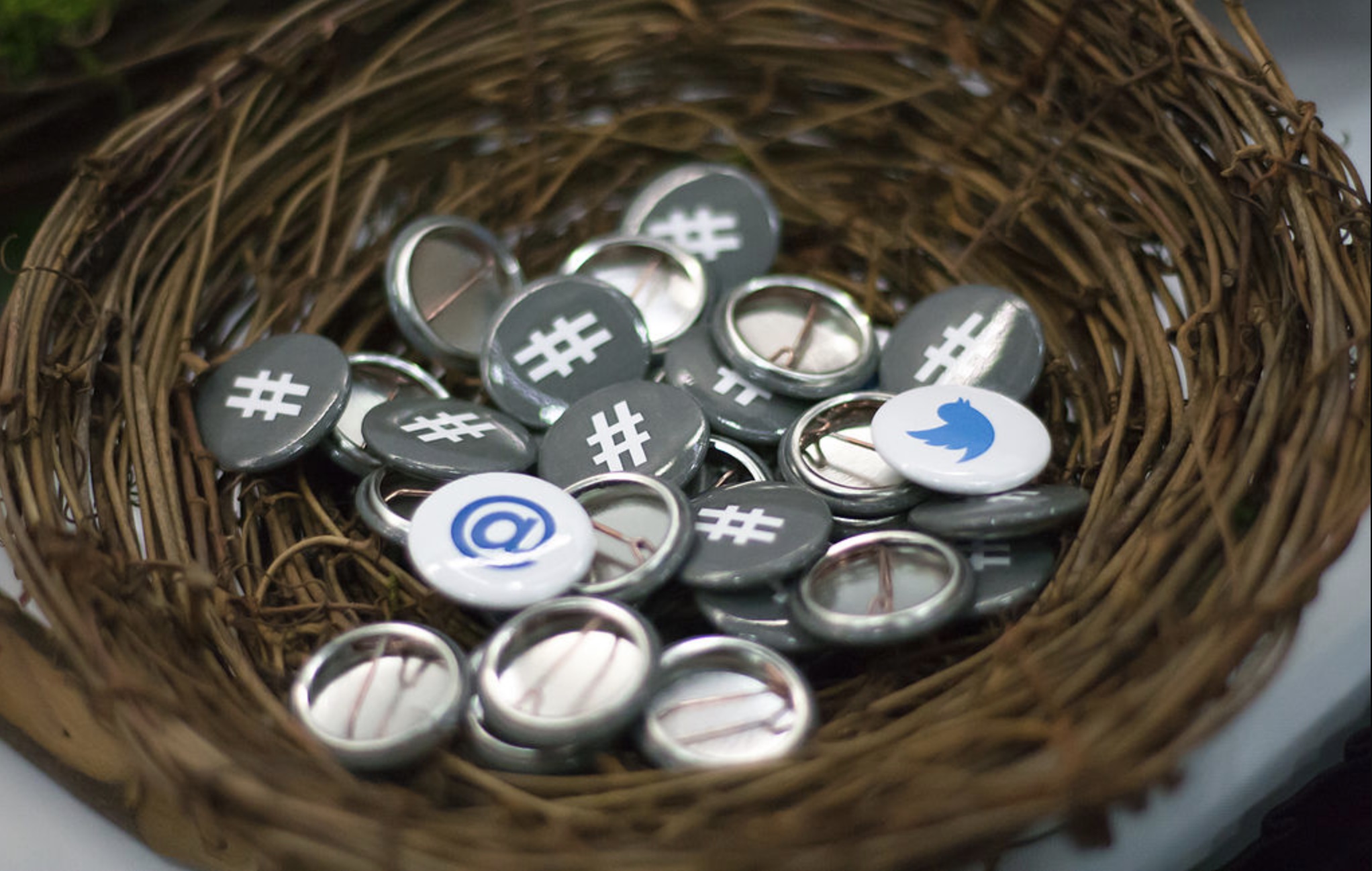 twitter pins in a basket