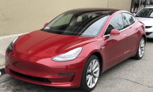 Tesla_Model_3_parked,_front_driver_side