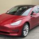 Tesla_Model_3_parked,_front_driver_side