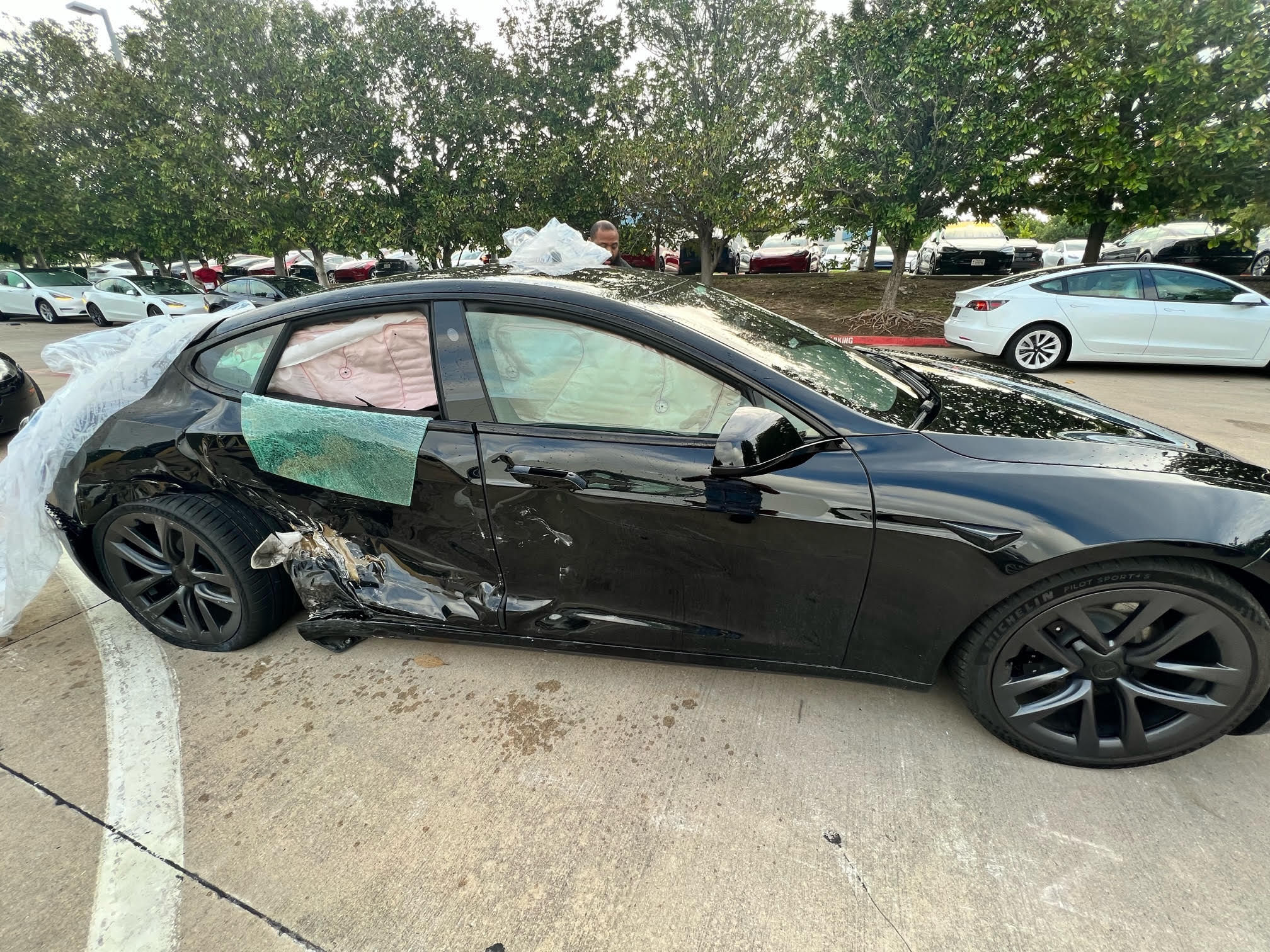 tesla model s plaid totaled service center