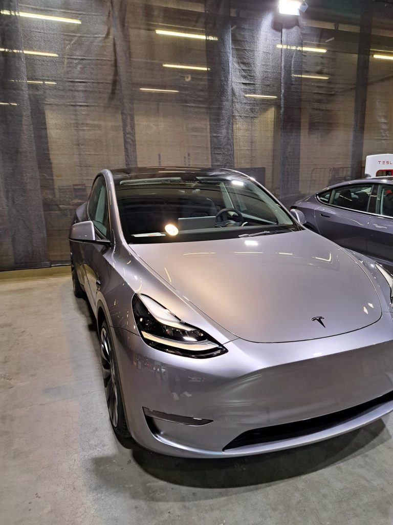 Tesla Model Y In Quicksilver Captured In Detail, Shows Paint Shop