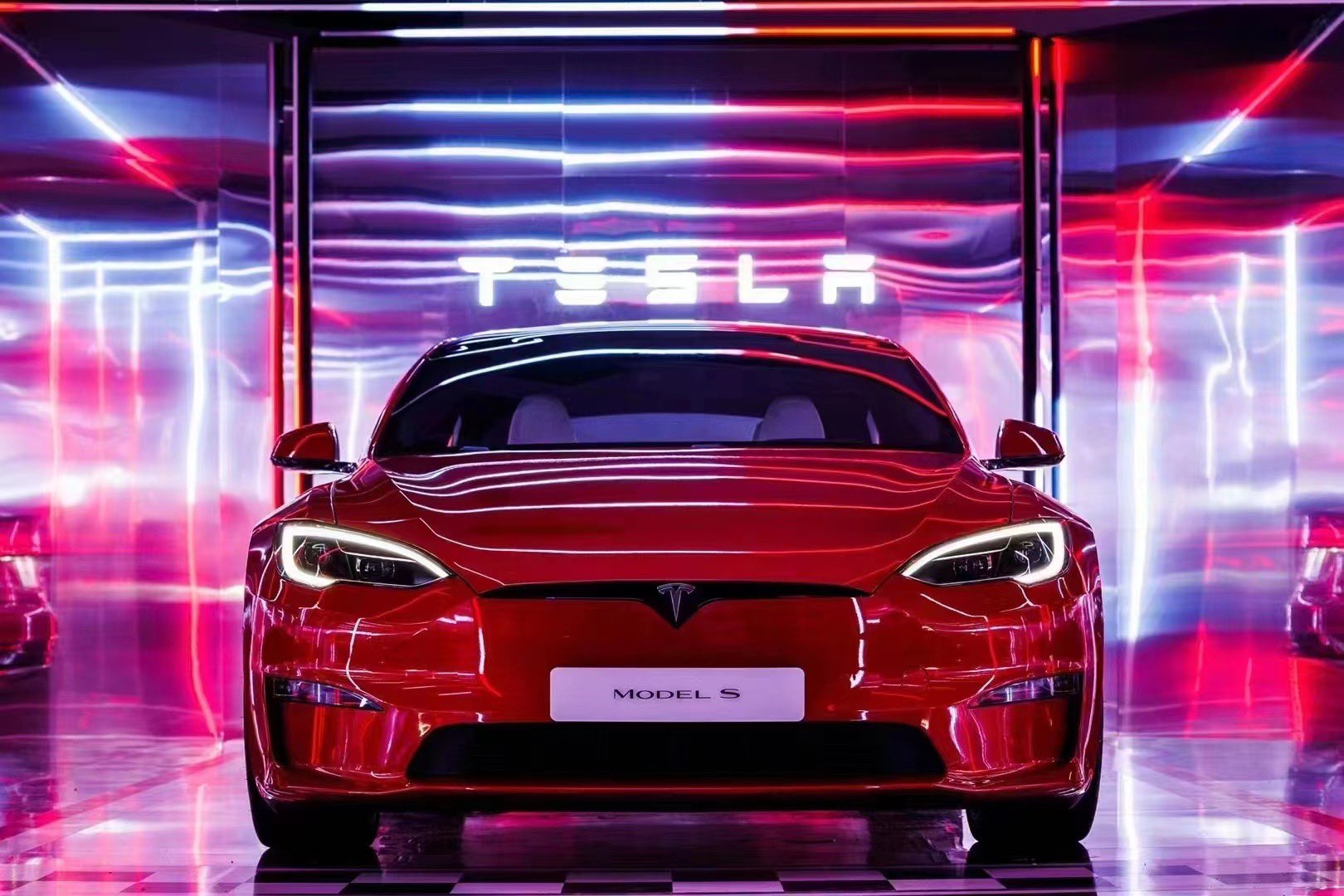 Tesla owners in Europe take Christmas Eve deliveries of their Plaid Model S and X cars