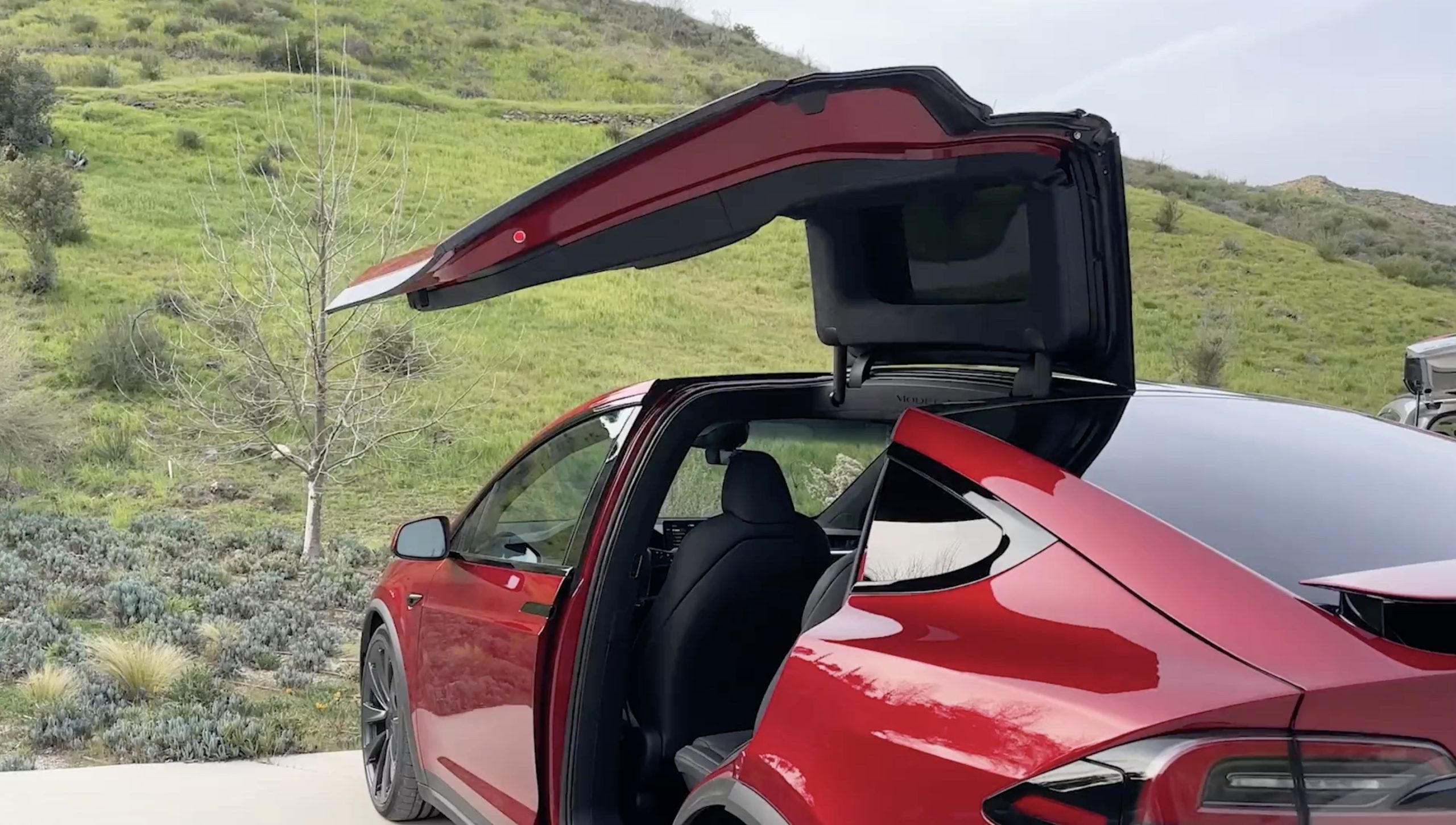 Tesla shares old footage of Model S with Falcon wing prototype doors