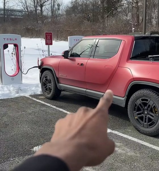 rivian charging at tesla supercharger