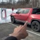 rivian charging at tesla supercharger