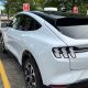 ford mustang mach-e at tesla supercharger