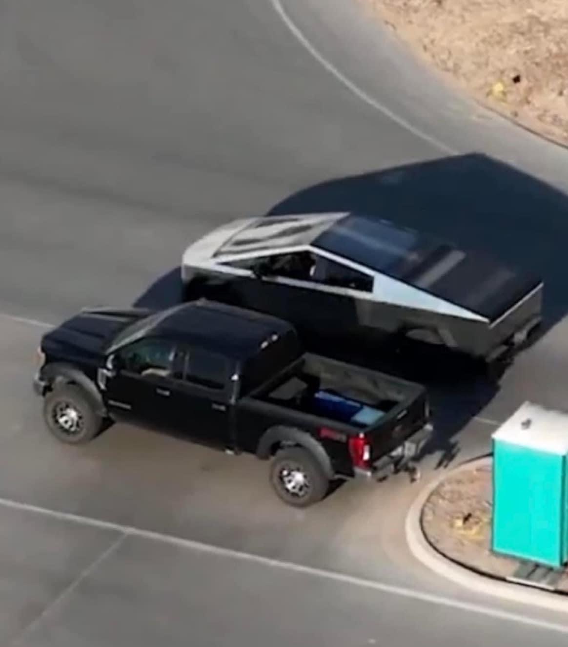 Tesla Cybertruck seen next to Ford F-250 giving size comparison