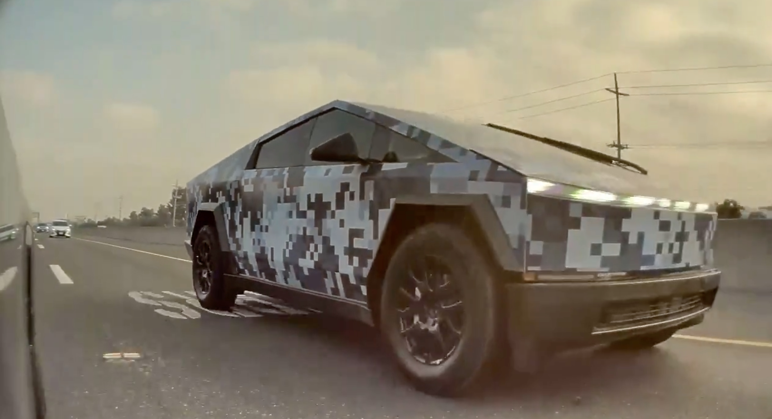 See Tesla’s blue digital camo-wrapped Cybertruck on video