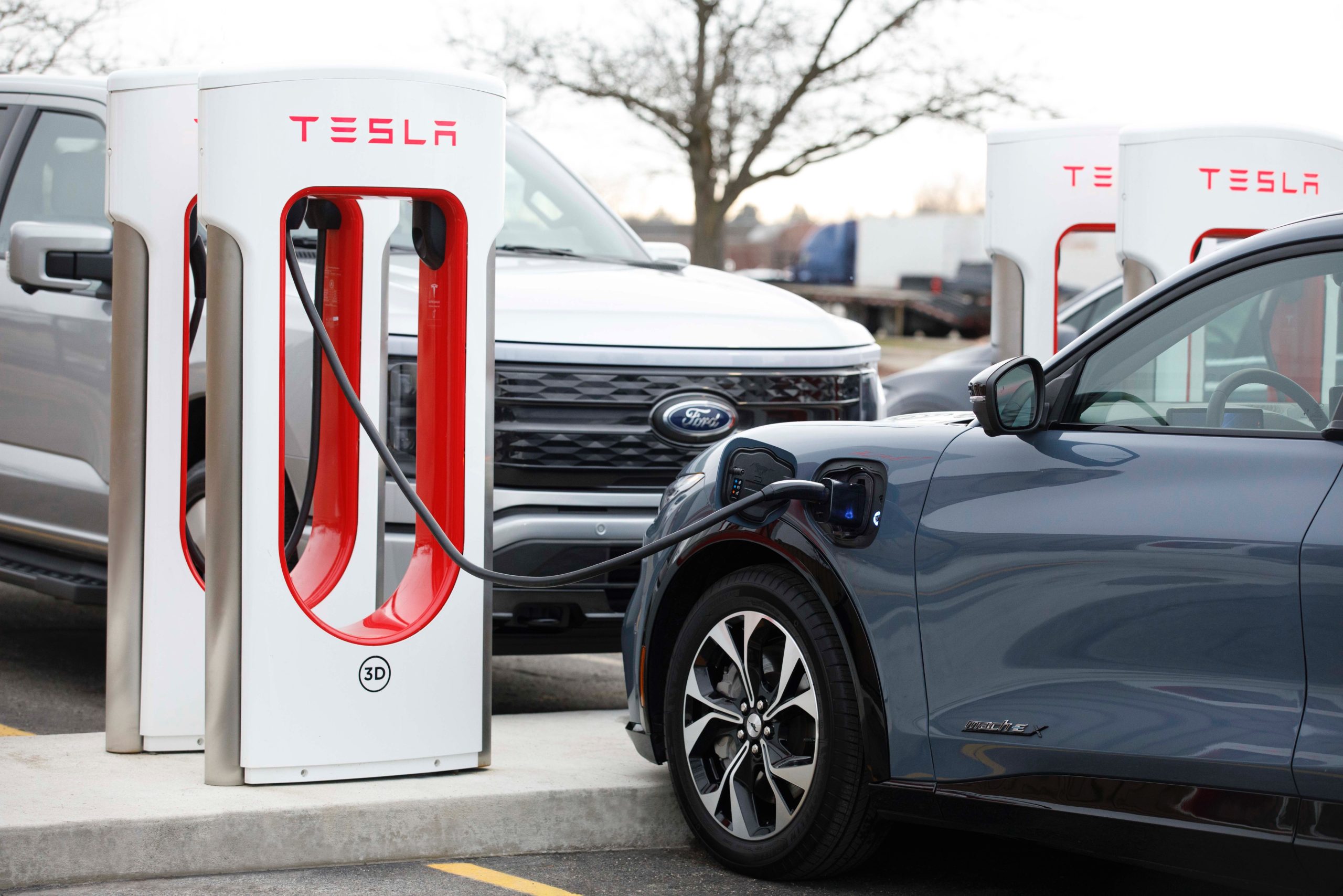 Ford CEO tests out Tesla NACS adaptor at a Supercharger site