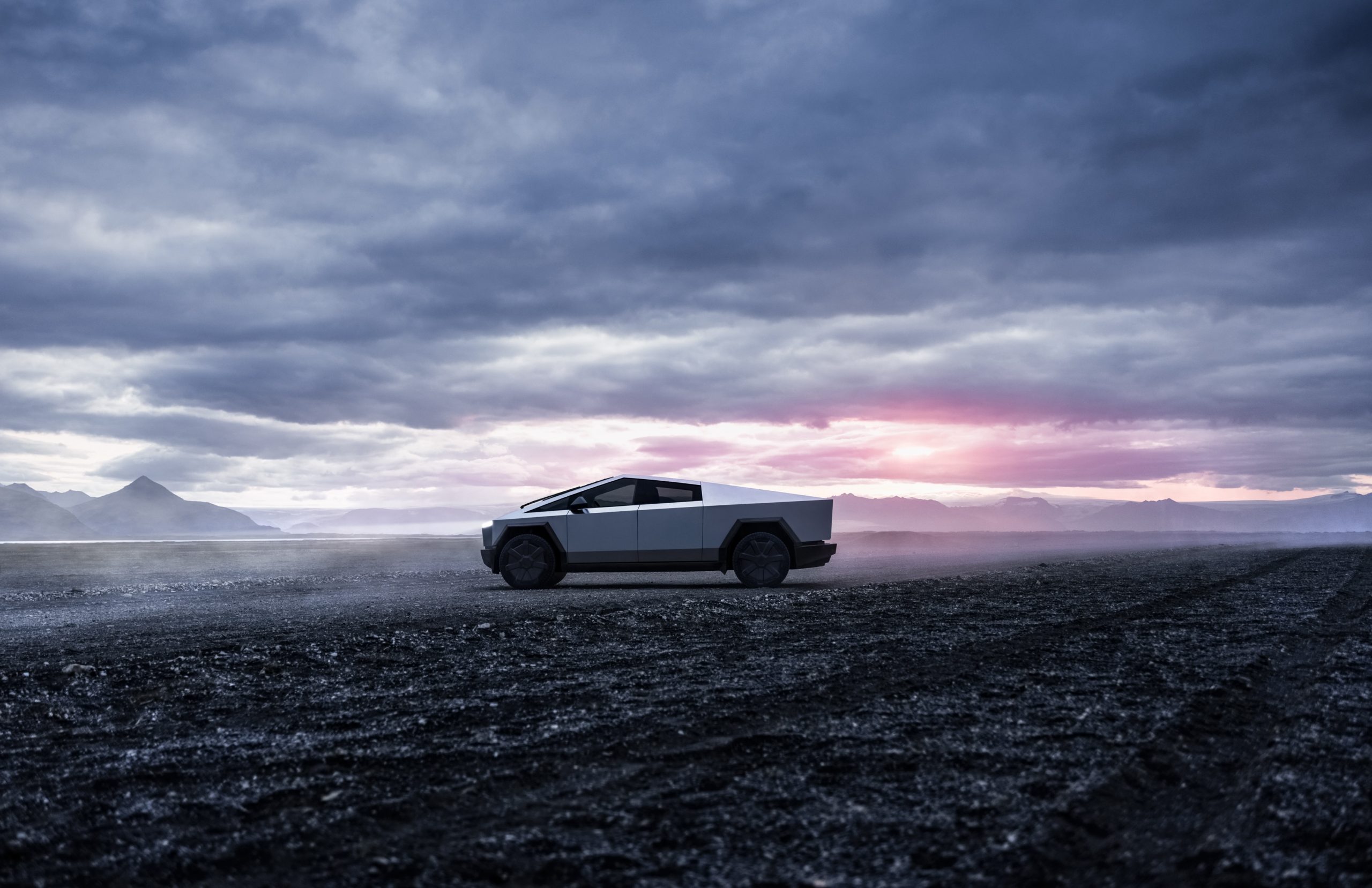 tesla cybertruck surrounded by clouds
