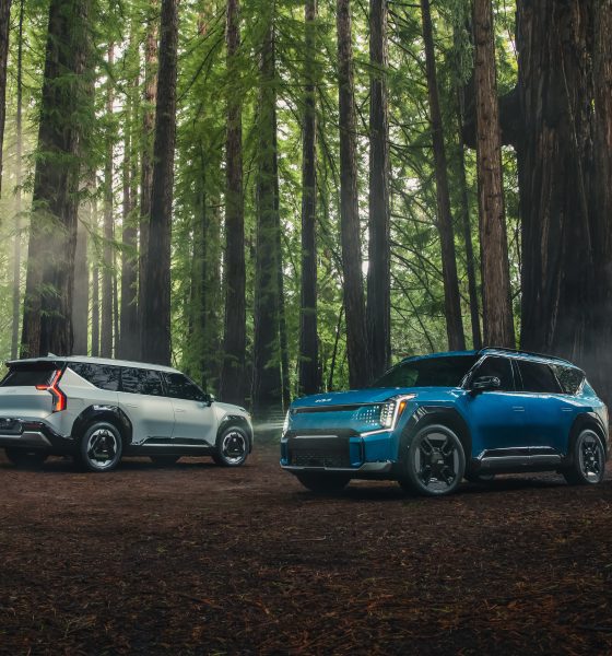 kia ev9 suvs in the woods