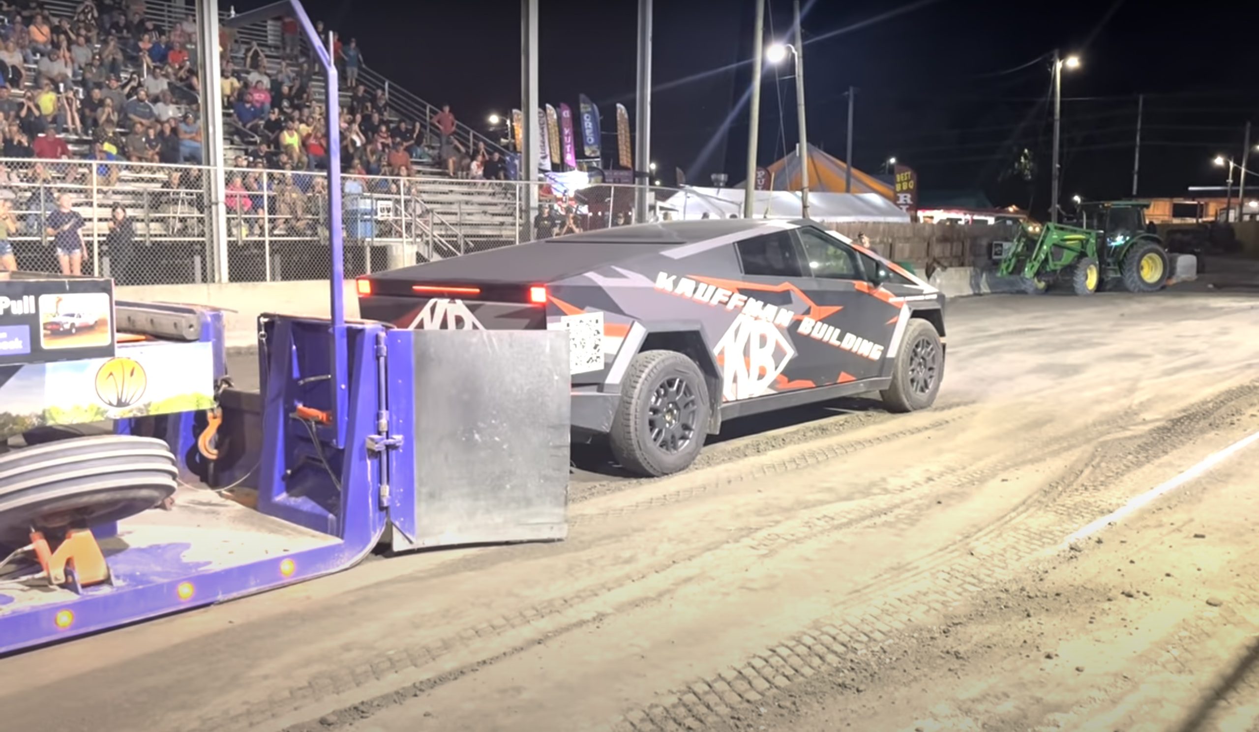 Tesla Cybertruck silences crowd with 260-ft sled pull
