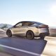 tesla model y quicksilver on road