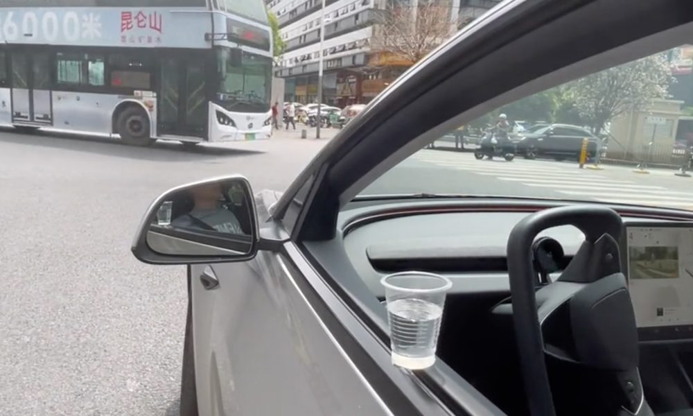 Watch Tesla’s FSD tackle water cup challenge, dirt roads in China
