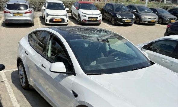 Tesla Model Y glass roof shattered from a piece of falling Iranian missile debris