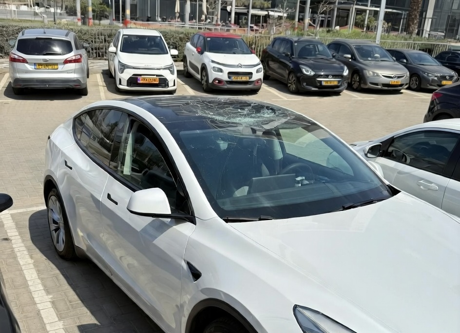 Tesla Model Y glass roof shattered from a piece of falling Iranian missile debris