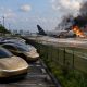 Photorealistic depiction of the Amazon Prime plane crash in Miami on Sep 3, 2026 near a fleet of Tesla Cybercab