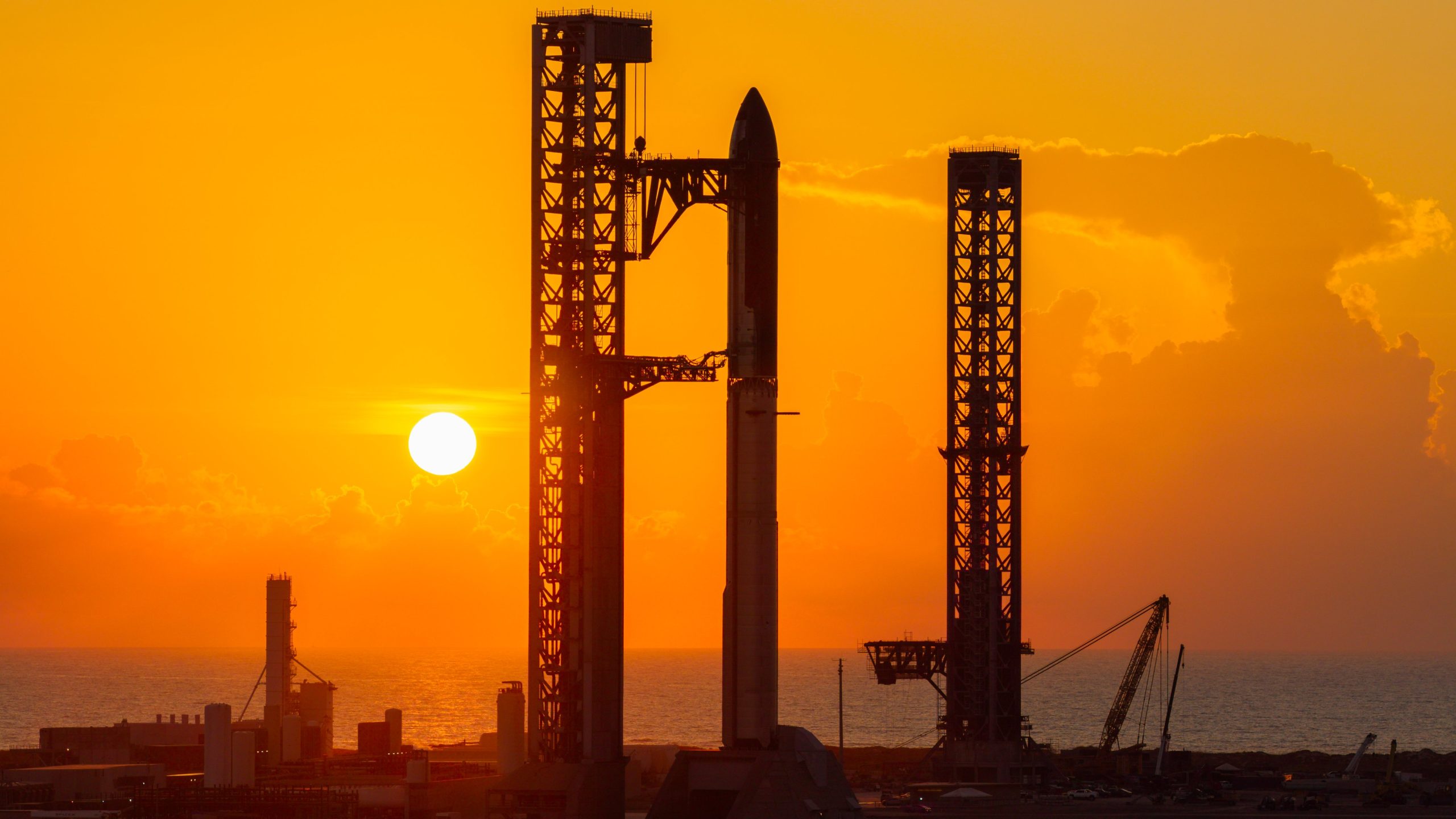 Sunrise at Starbase. Starship is stacked for opportunistic full-stack testing ahead of Flight 14 via SpaceX
