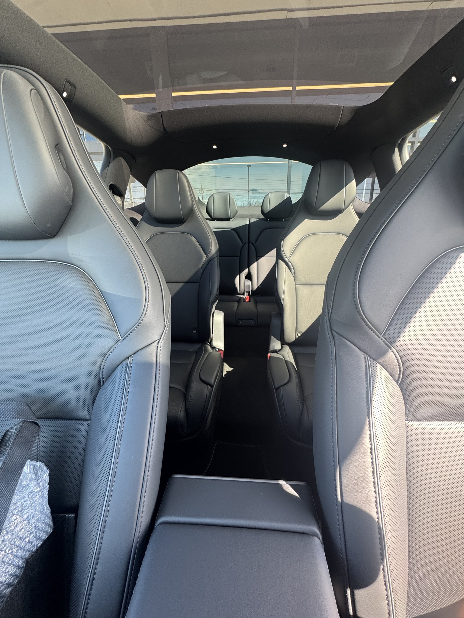 tesla model y l interior from driver's seat