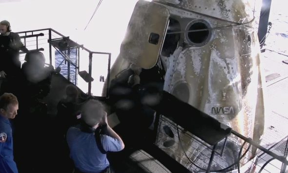 SpaceX's Crew Dragon Freedom sits aboard the recovery ship Shannon after splashing down off the coast of Los Angeles with the Crew-12 astronauts on October 8, 2026. (Credit: SpaceX)