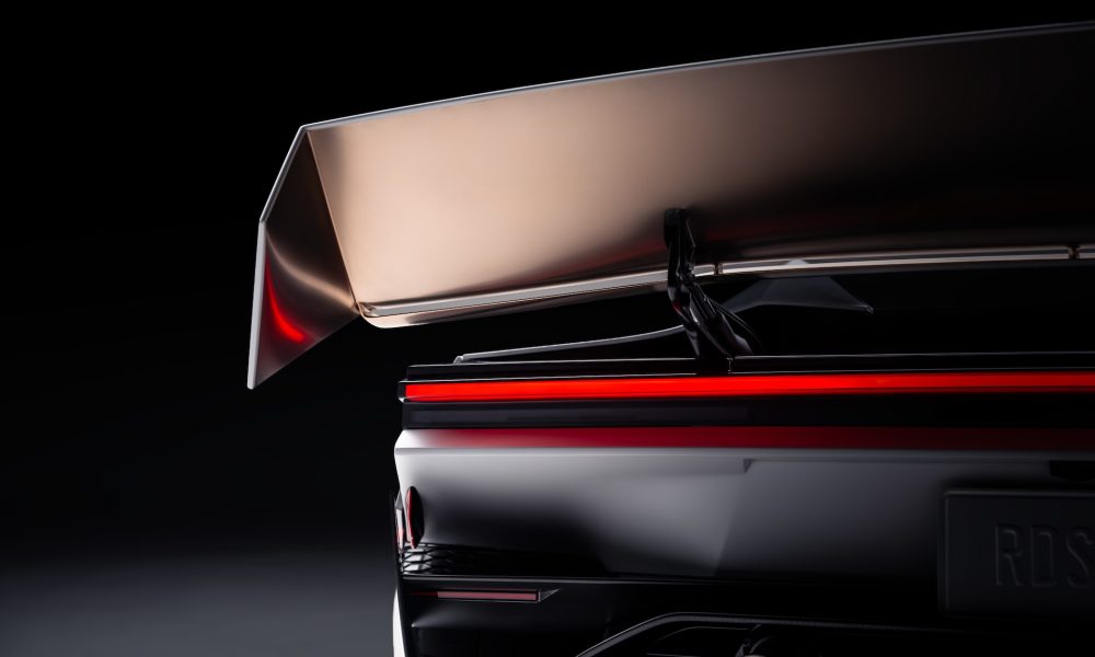 The Roadster’s rear wing, one of the aerodynamic elements Tesla pairs with a fan-based downforce system. (Image: Tesla)