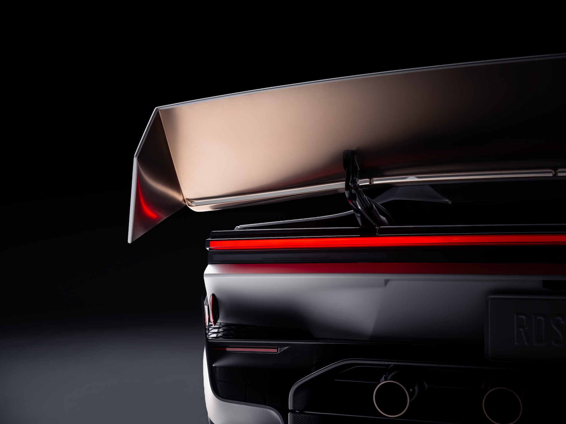 The Roadster’s rear wing, one of the aerodynamic elements Tesla pairs with a fan-based downforce system. (Image: Tesla)